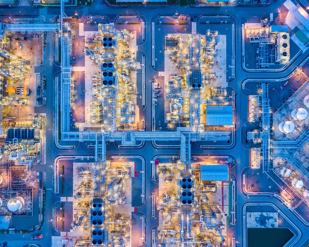 Overhead view of oil refinery at night